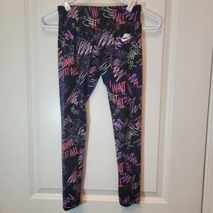 NIKE girl black leggings with Just Do It multi color Medium